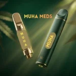 Muha Meds cannabis cartridge and disposable vape device with MUHA branding on emerald green background — premium THC products at licensed dispensaries